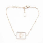 Bracelet pendentif strass et lotus