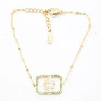 Bracelet pendentif strass et lotus